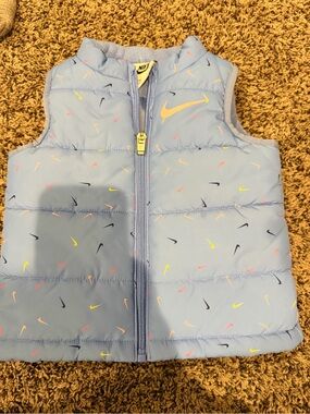 Nike Kids Light Blue Puffer Vest with Multicolor Swooshes